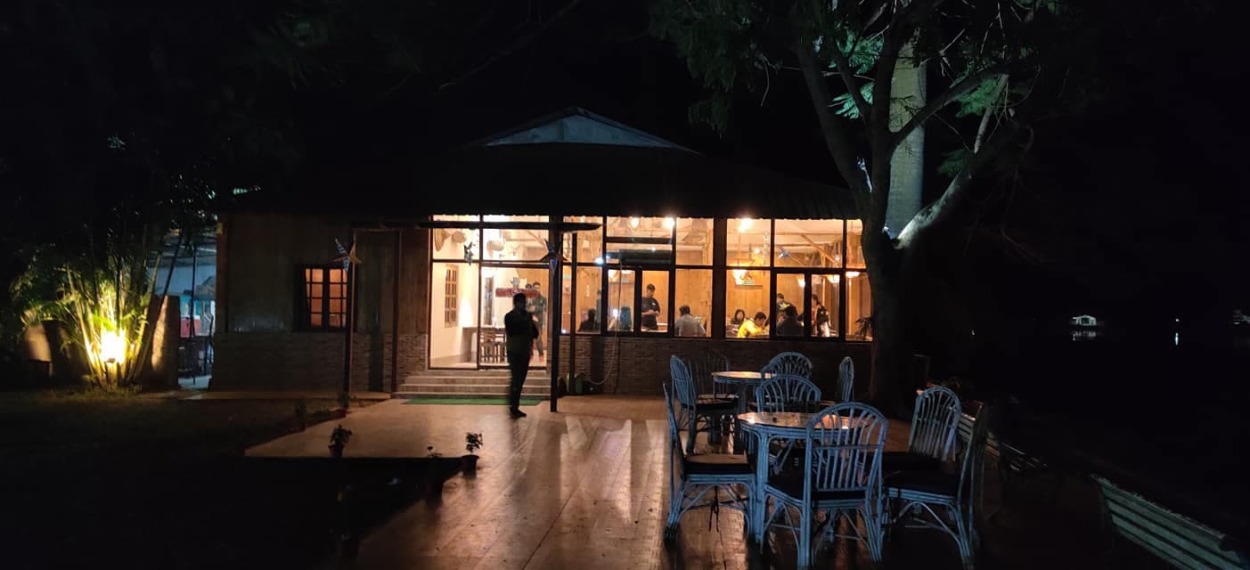 Elegant interior dining area of Heritage Jaysagar with warm lighting and traditional decor.